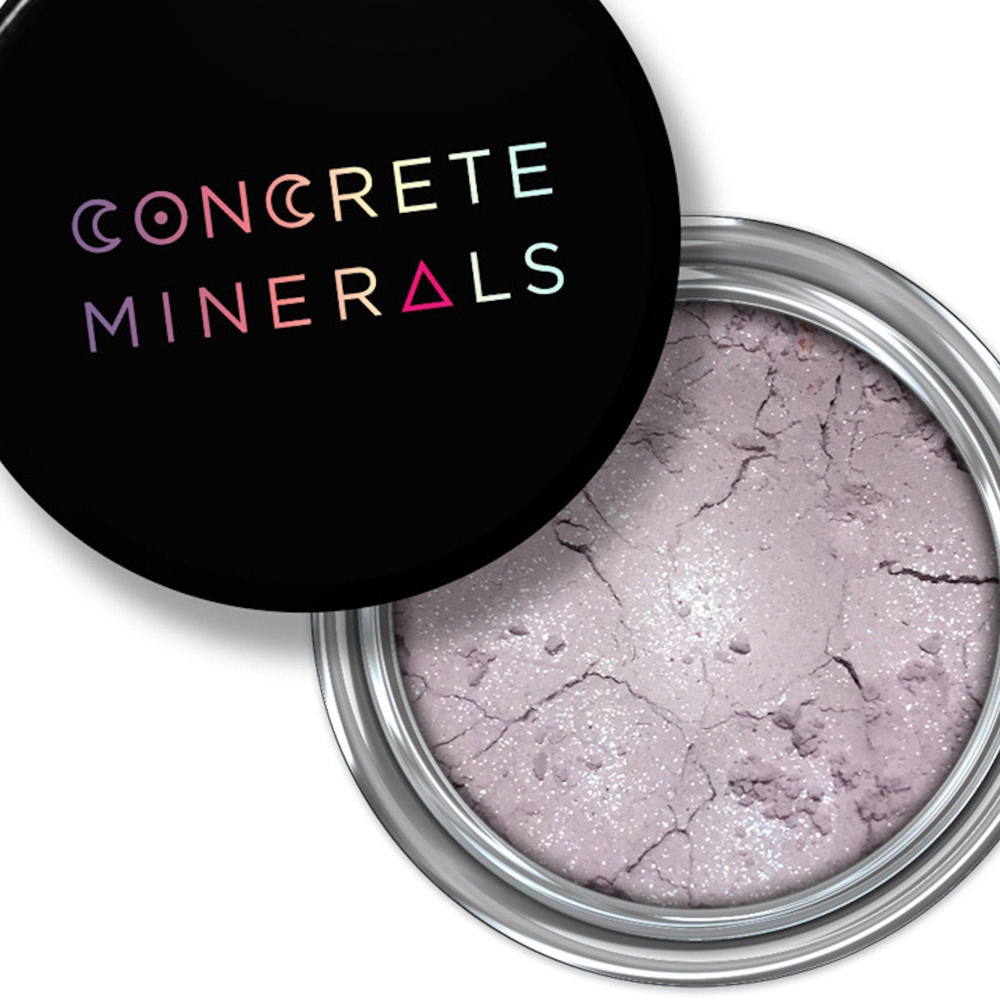 Mineral eyeshadow, light purple powder with silver shimmer, in a silver container, Concrete Minerals brand