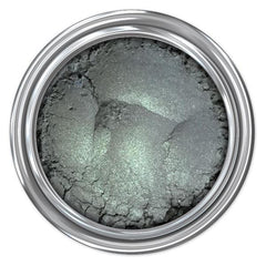 Eyeshadow powder in silver-green color with metallic finish inside a silver metal container