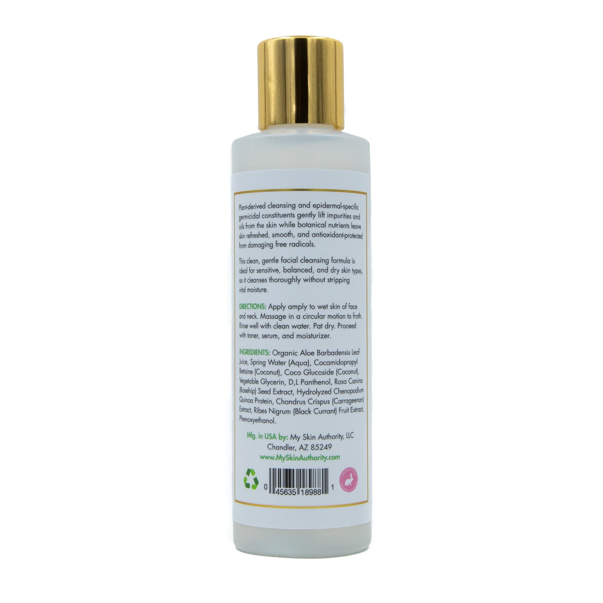 Facial cleanser bottle with gold cap, white label, and brand text visible on packaging