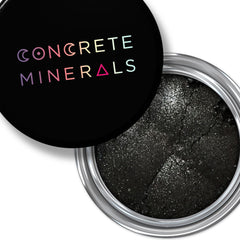 Black mineral eyeshadow in compact case with smooth matte finish and vegan cruelty-free label