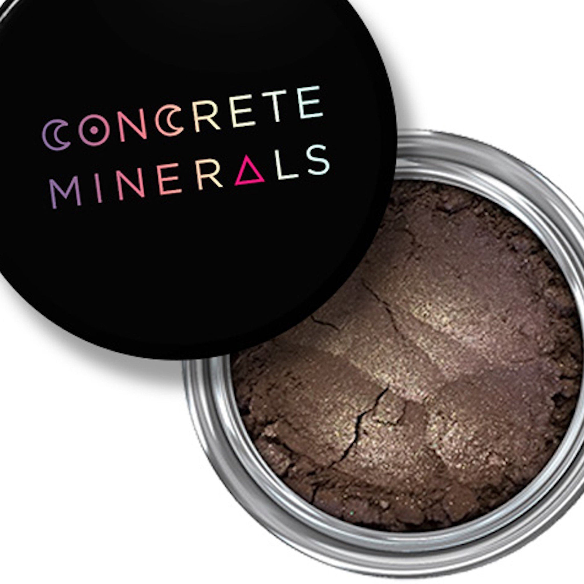 Mineral eyeshadow in dark brown with silver shimmer, in a metal container, Concrete Minerals brand
