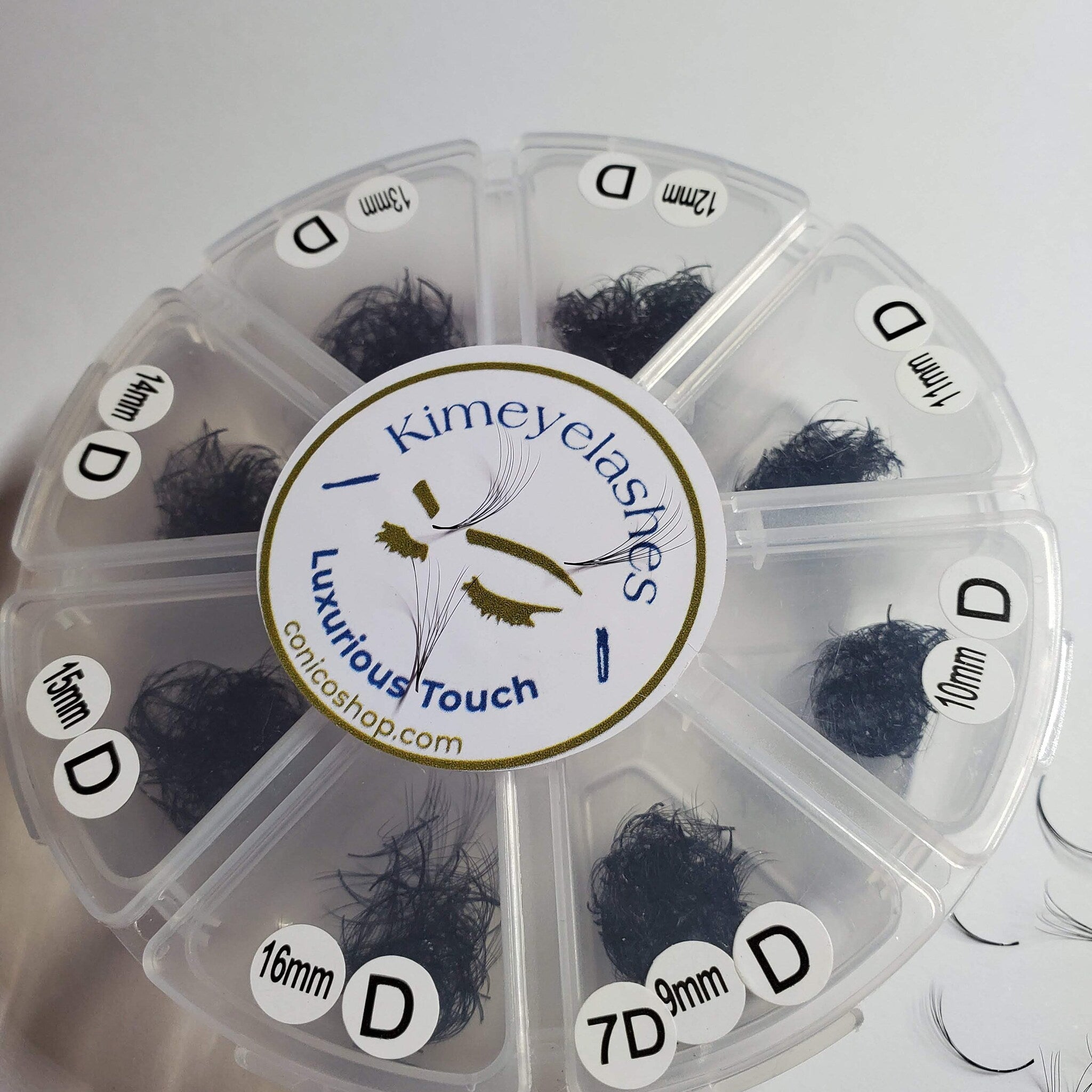 Eyelash extensions in black, clustered style, with Kimeyelashes brand label and size indicators