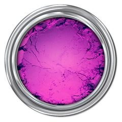 Pink powder in a silver metal can with visible texture and cracks