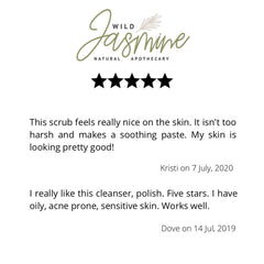 Wild Jasmine brand logo with black stars, green script, and white background