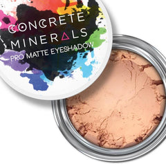Eyeshadow powder with light brown color in a silver metal container, Concrete Minerals brand visible
