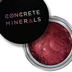 Compact of Altar of Roses mineral eyeshadow in a matte rose shade with sleek black packaging and gold lettering