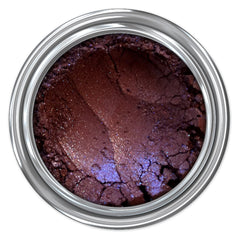 Eye shadow, brown and purple metallic powder in a silver container
