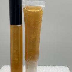 Lip gloss tubes with gold liquid and black cap, clear plastic tube with gold gloss, Shining Essentials by Kylee