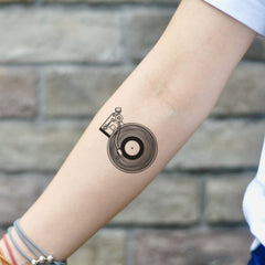 Set of two skin-safe temporary tattoo stickers in floral and geometric designs on clear backing