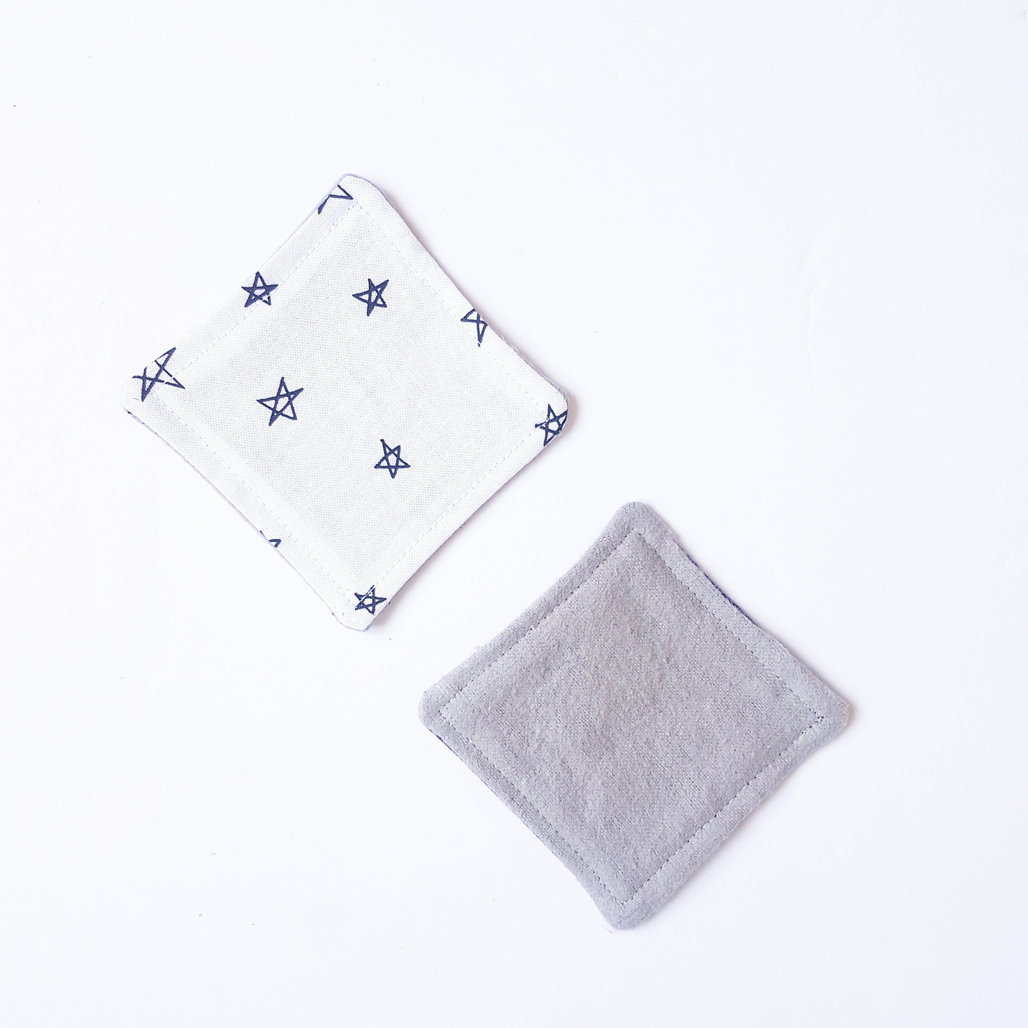 Cloth coasters with star pattern, gray and white fabric, diamond shape design