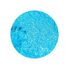 Close-up of chameleon moonshifter loose pigment showing multichrome shift from gold to green in fine mineral texture