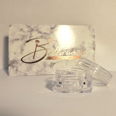Clear jar with lid, marble box with gold text, Bellavoni brand
