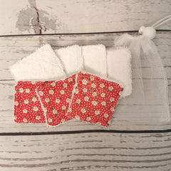 Reusable face wipes, white terry cloth and red floral print, with mesh bag for storage