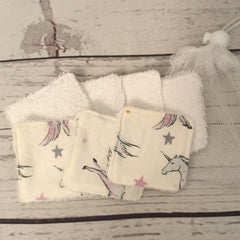 Washable face pads with unicorn print, white terry cloth, and mesh bag for washing