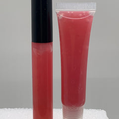 Lip gloss tubes with red liquid and black cap, clear plastic tube with red gloss inside
