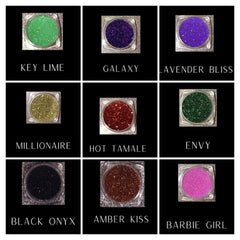 Close-up of vibrant glitter eye shadow palette showing shimmering gold and bronze shades with high-pigment sparkle