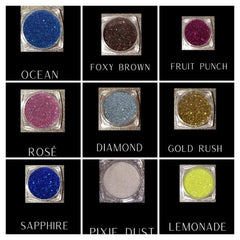 Side view of glitter eye shadow palette showing six vibrant shades with reflective shimmer particles in compact case