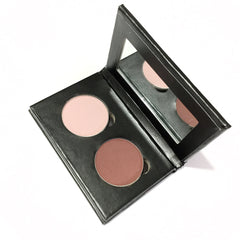 Close-up of Pink Wine Pressed Mineral Eye Shadow Duo showing smooth matte and shimmer textures in rose and wine hues.