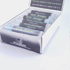 Lip balm tubes with black labels, clear caps, and "Blue Hawaiian" text in a box