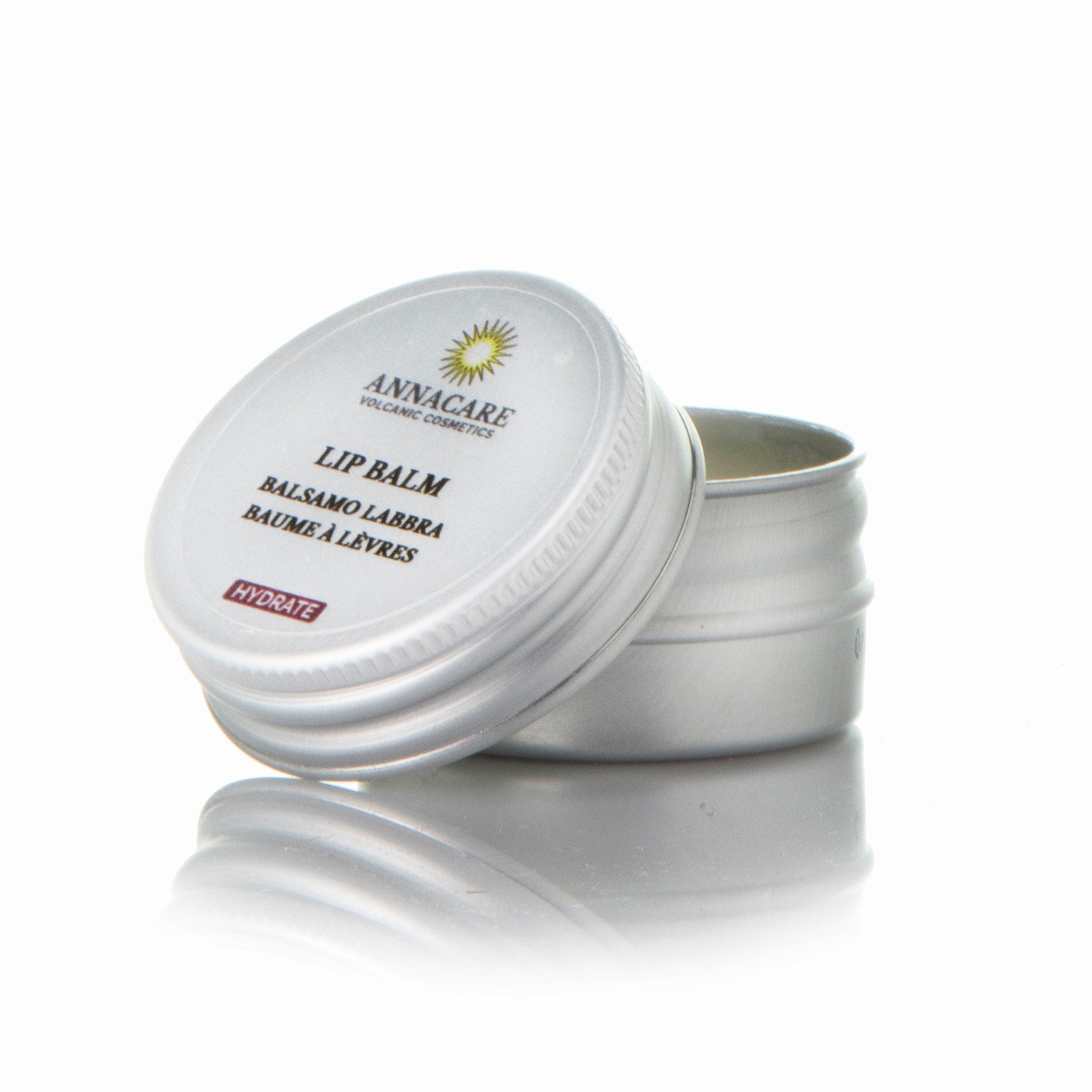 Lip balm in silver metal tin with Annacare label and "Hydrate" text visible