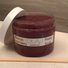 Foamy scrub jar with dark red color and white lid, OLJ natural label visible