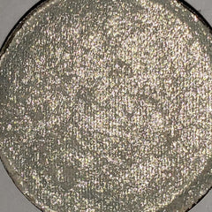 Golden eyeshadow, textured silver metallic finish, round compact shape