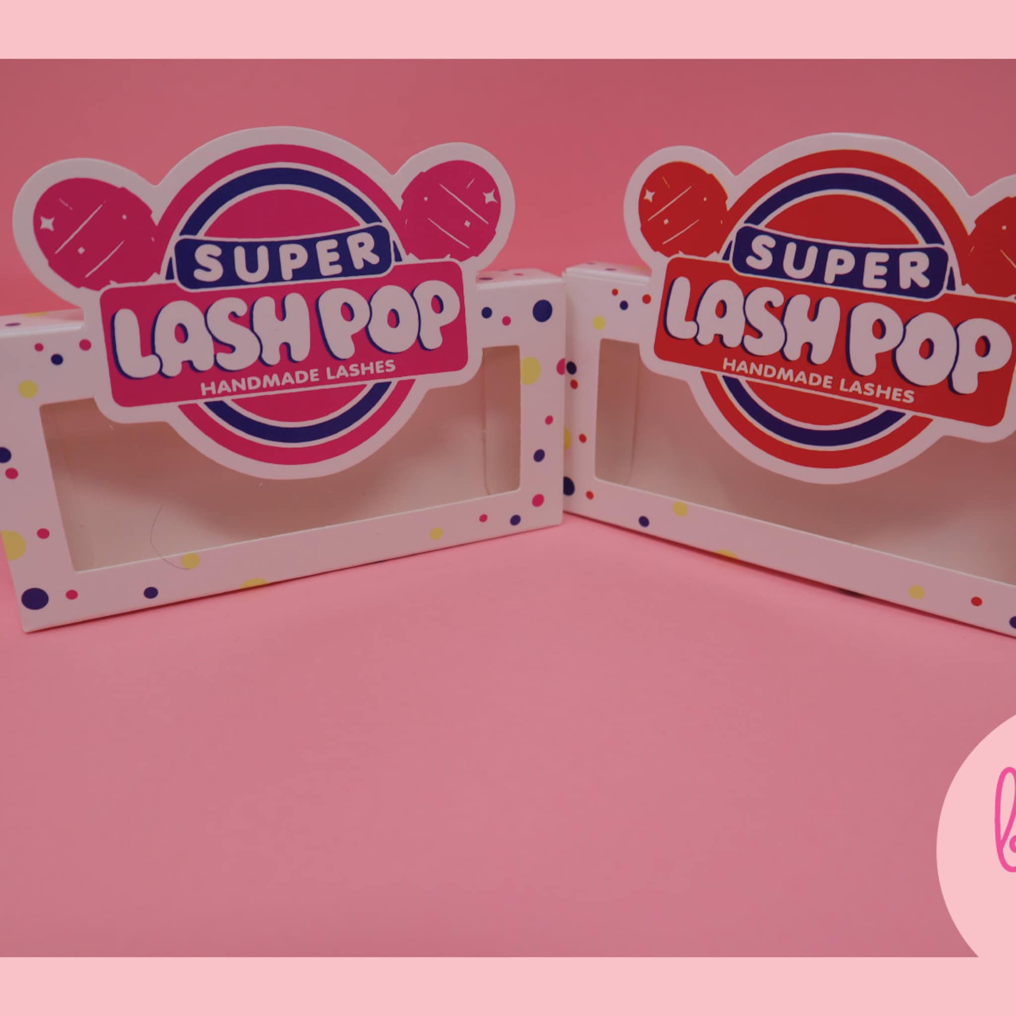 LASHPOP box packaging with white, pink, and blue branding with polka dot trim