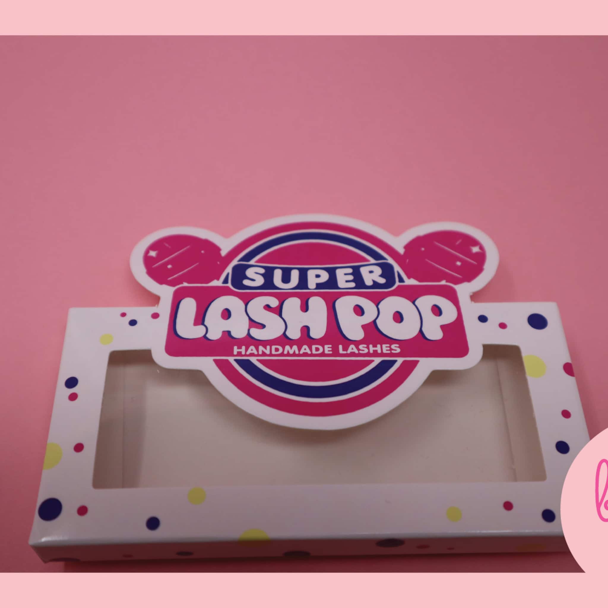 Lash pop packaging, white box with polka dots, pink and blue branding, "Super Lash Pop" text