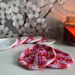 Makeup remover pads, pink and white crochet, round shape, close up