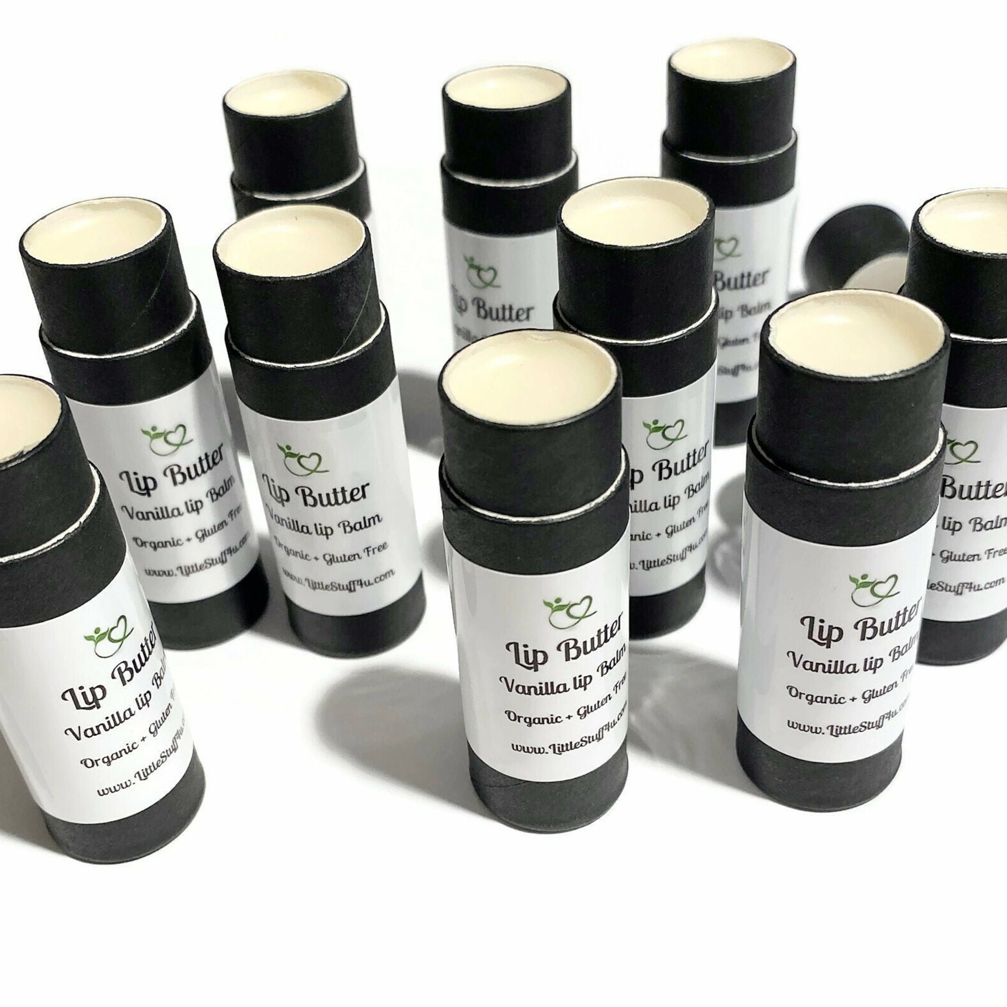 Lip Butter tubes with black cardboard, white labels, and cream balm, LittleStuff4u brand visible