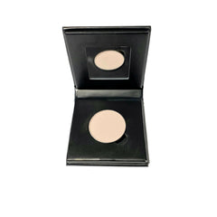 Square matte beige eyeshadow compact with minimalist paperboard casing and refillable design