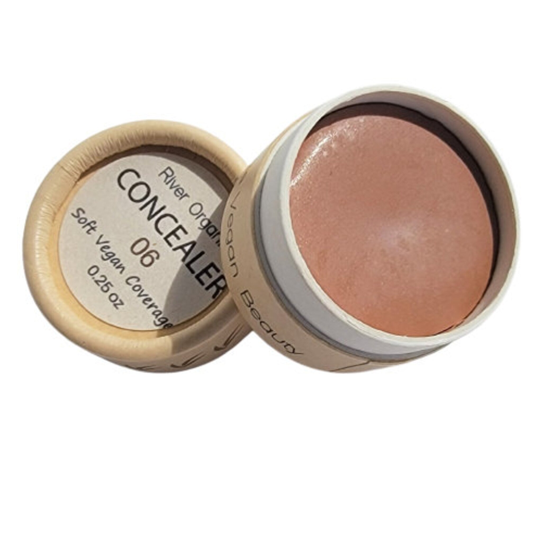 Side view of vegan zero waste concealer in matte nude shade with minimalist cardboard tube packaging