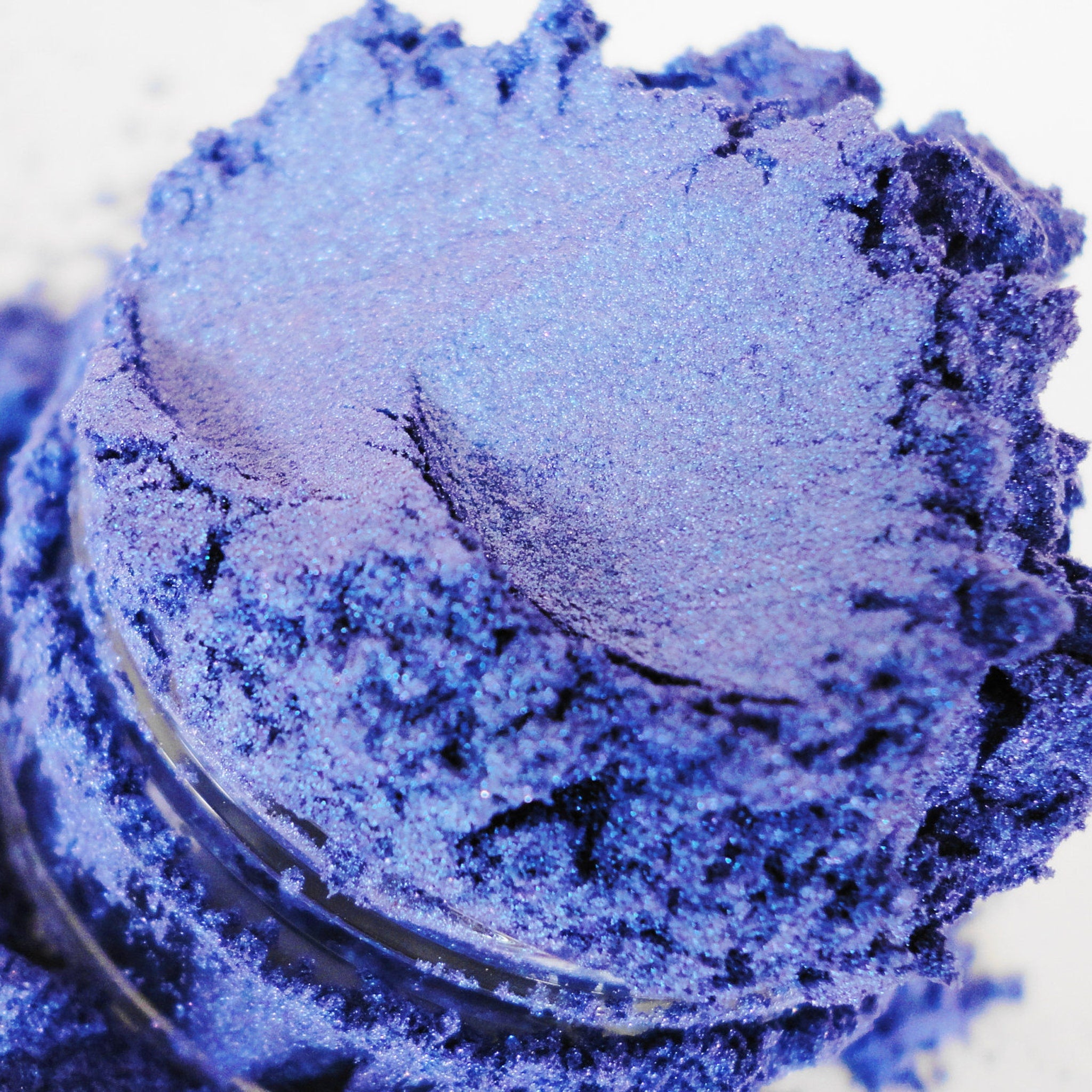 Mineral eyeshadow, periwinkle purple shimmer powder, in a glass jar, for eye makeup application
