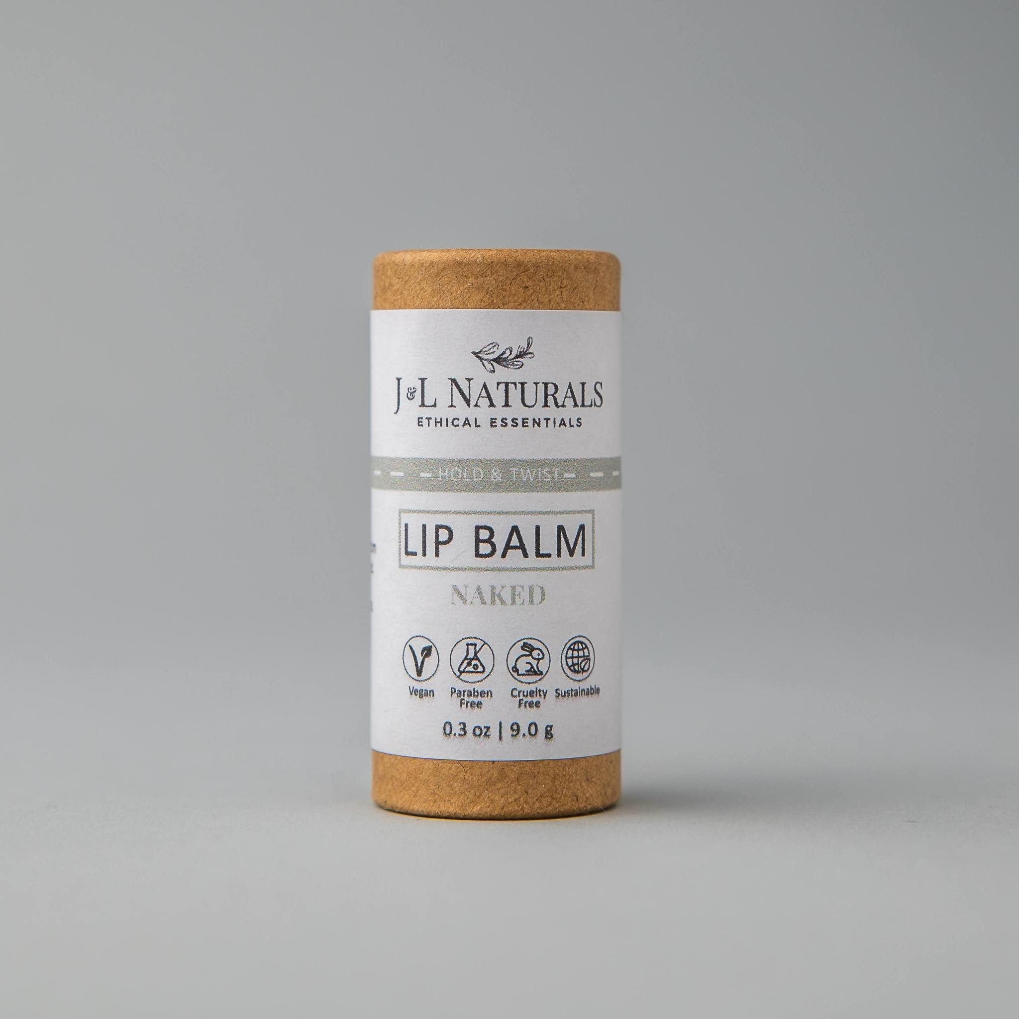 Lip balm tube with brown cardboard and white label, J&L Naturals branding visible