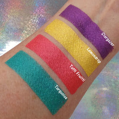 Close-up of pressed mineral eyeshadow in vibrant purple with smooth shimmer finish