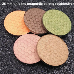 Close-up of pressed lavender mineral eyeshadow with soft shimmer finish in compact case