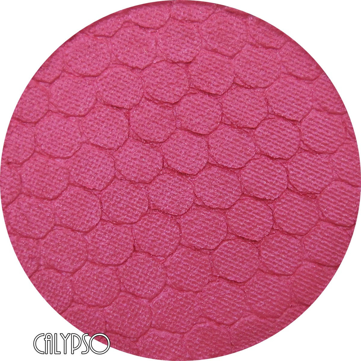 Close-up of pressed mineral eyeshadow in vibrant calypso pink with smooth matte finish