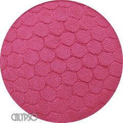 Close-up of pressed mineral eyeshadow in vibrant calypso pink with smooth matte finish