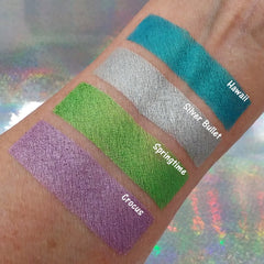 Close-up of pressed mineral eyeshadow in soft lavender with crocus undertones and smooth matte finish