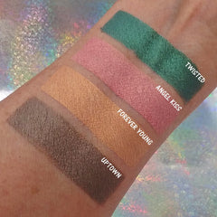 Close-up of pressed mineral eyeshadow in rich chocolate brown with smooth satin finish