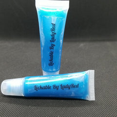 Lip gloss tubes with blue liquid and "Lickable By LadyRed" text on black background.