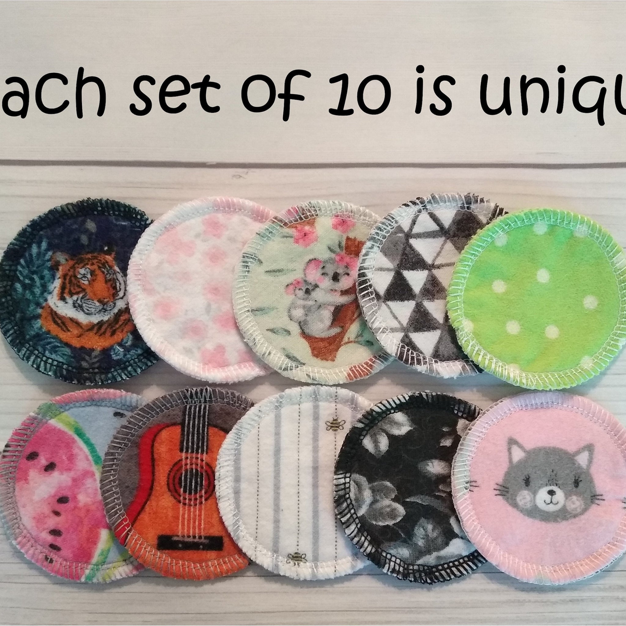 Reusable facial rounds with assorted patterns and colors, including tiger, koala, and cat designs