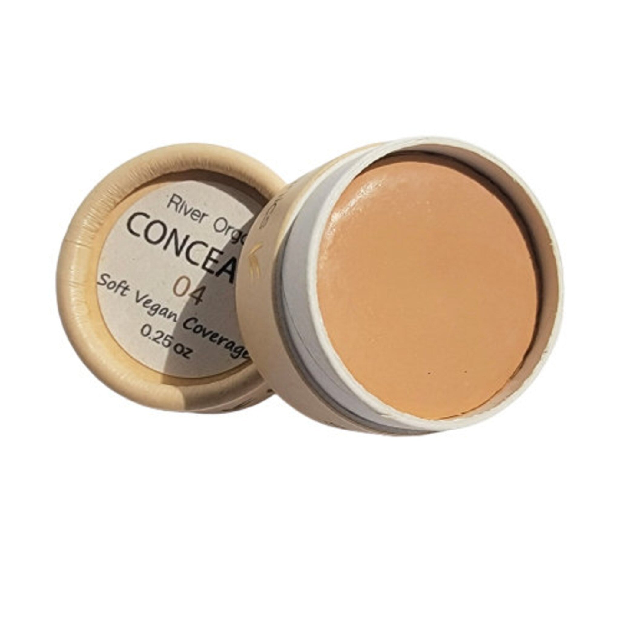 Close-up of vegan zero waste concealer palette showing creamy matte texture in neutral beige shade