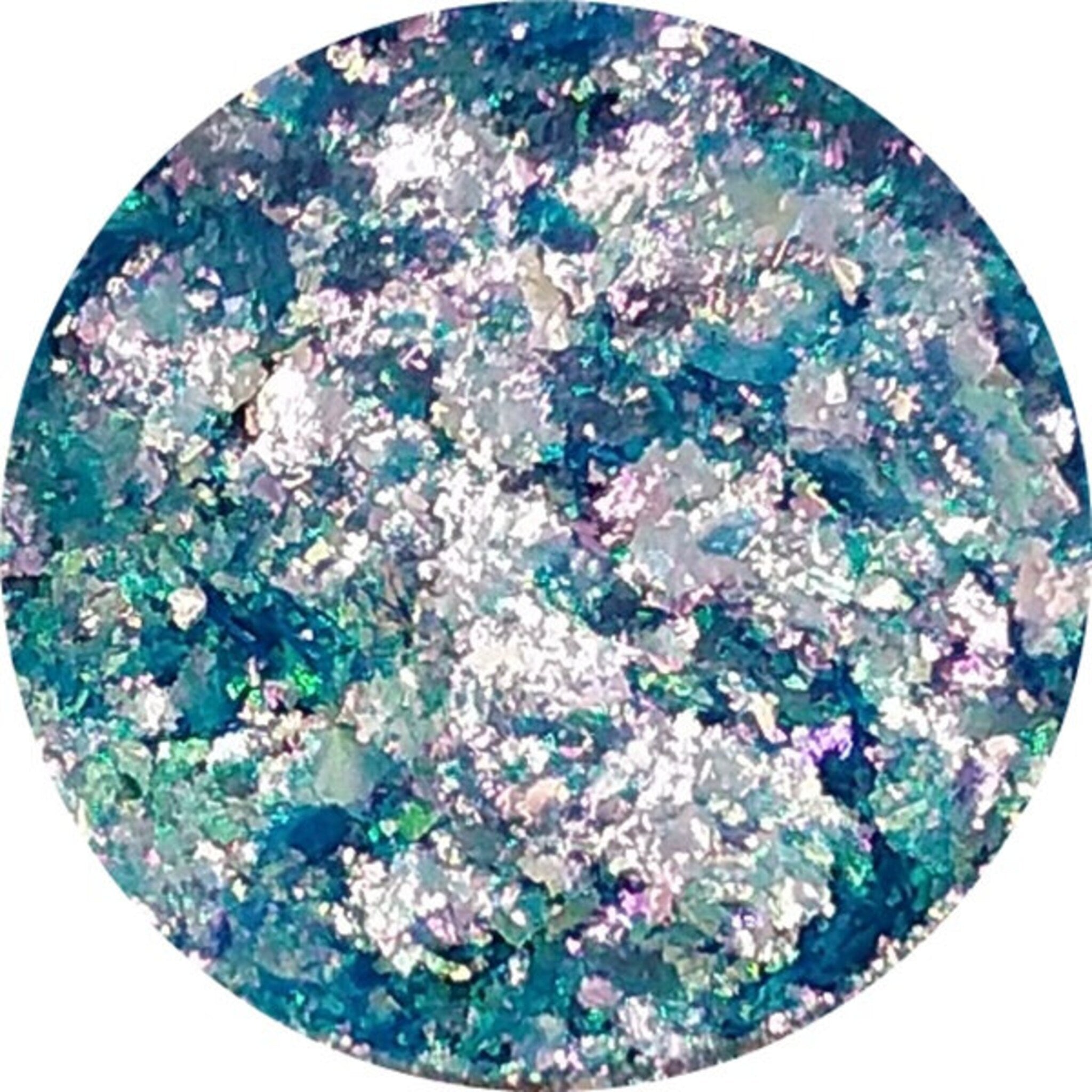 Side view of Fairy Magic Chromaflake Eyeshadow palette showing iridescent pink and purple shades with glitter flecks