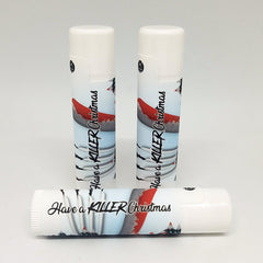 Lip balm tubes with white caps, printed with "Have a KILLER Christmas" design, and red accents
