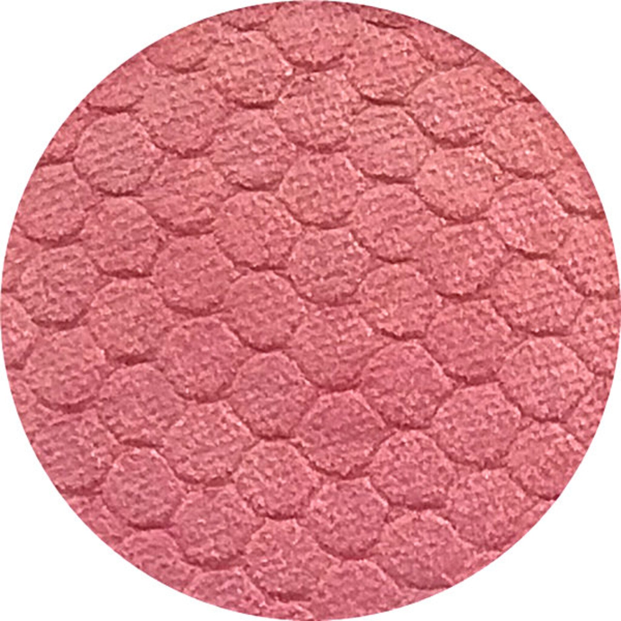 Open compact showcasing multi-chrome eyeshadow with iridescent color shift in gradient hues