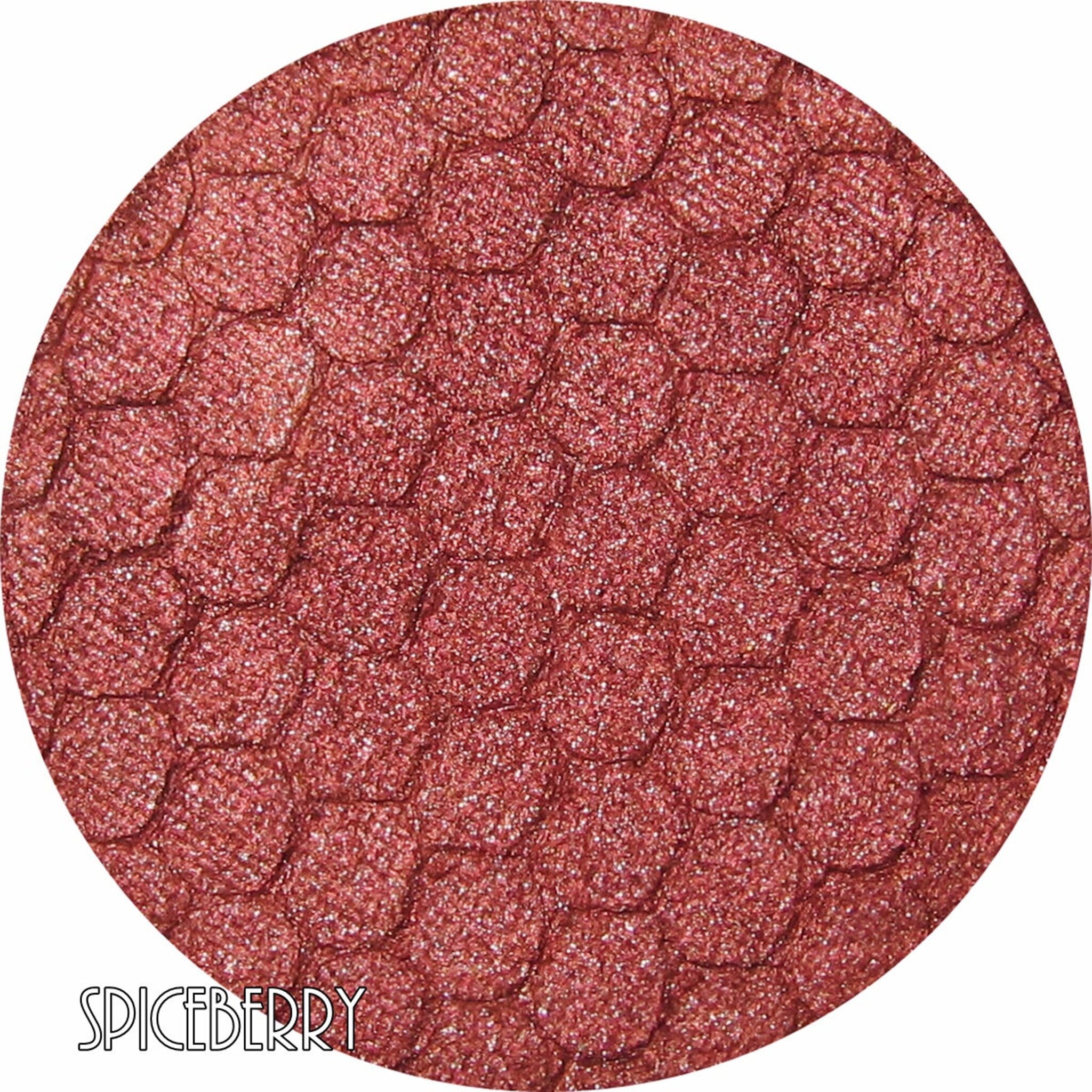 Pressed eyeshadow compact with rich coppery red spiceberry shade and smooth mineral finish