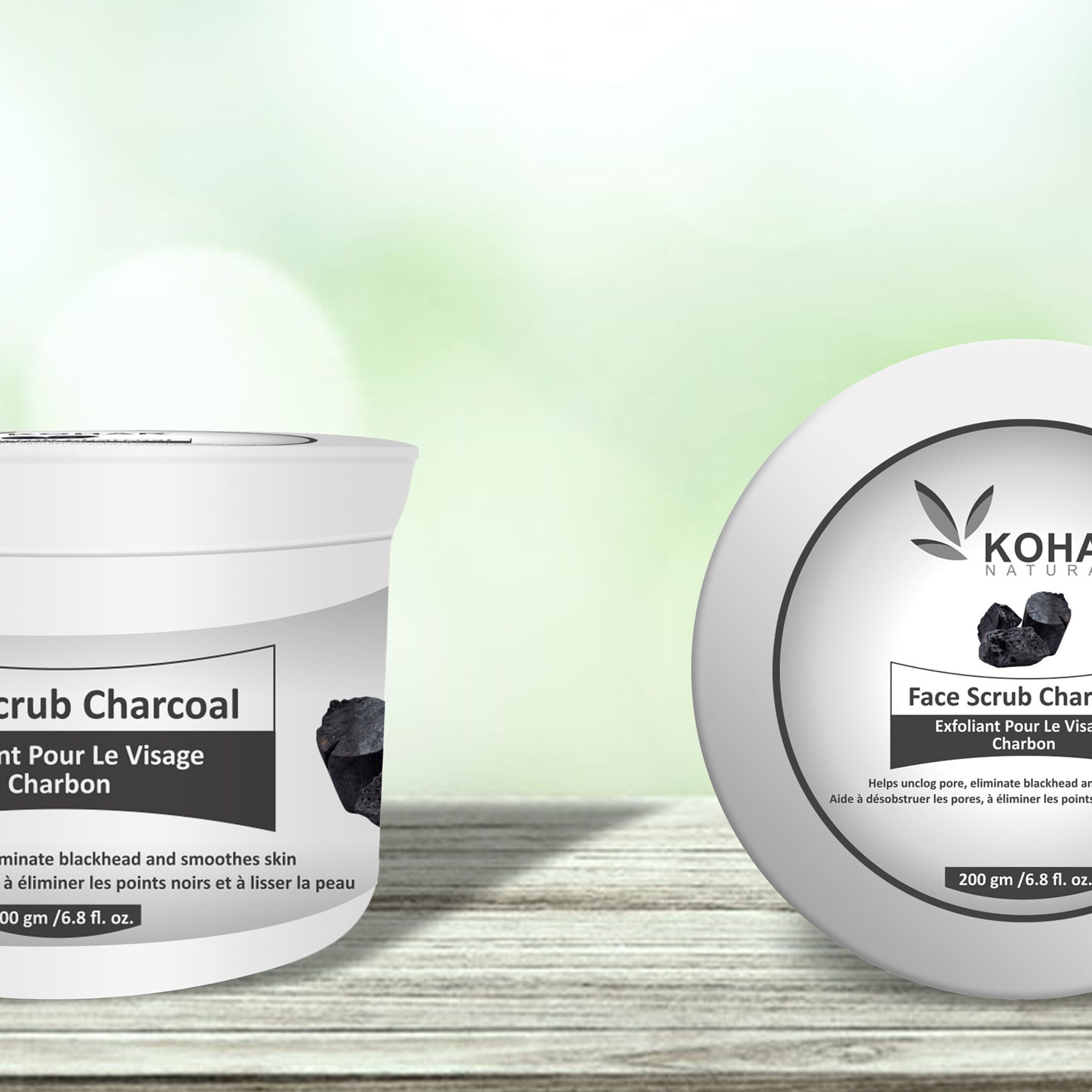 Charcoal face scrub in white jar with black charcoal pieces, KOHA brand visible