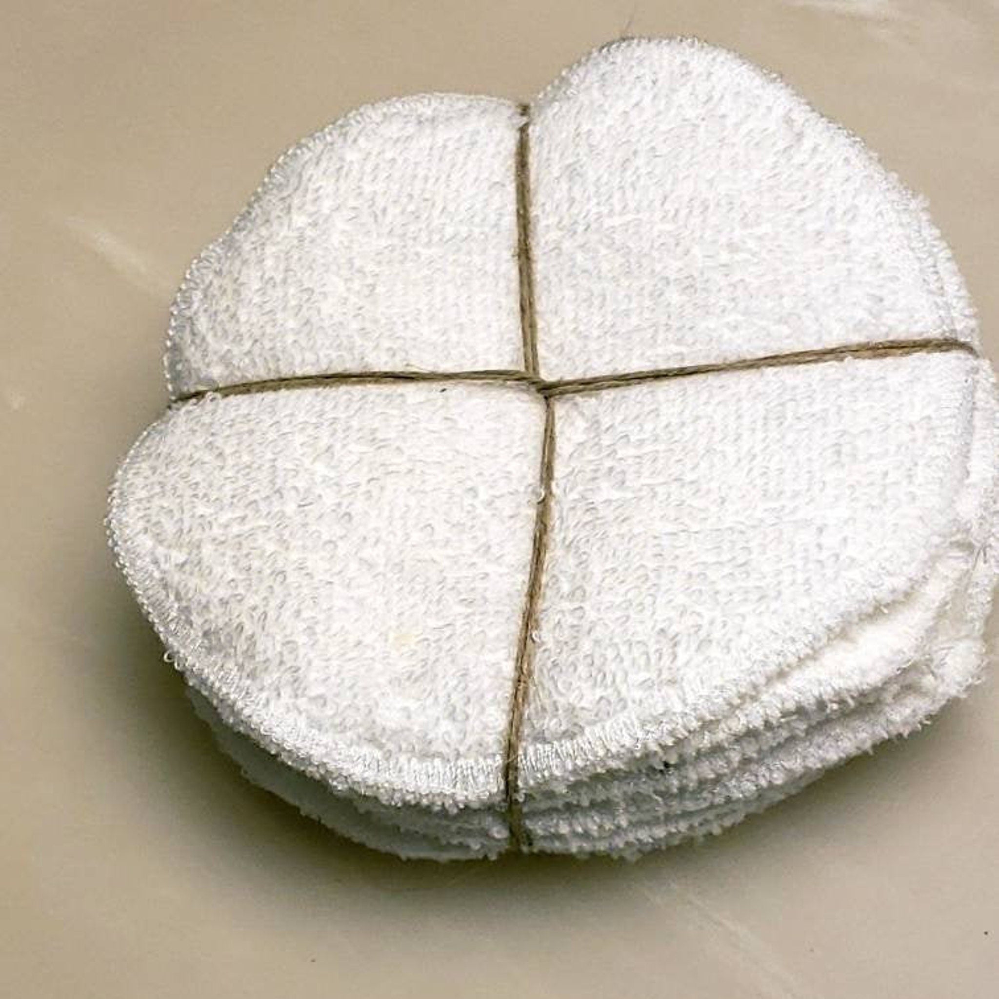 Reusable facial rounds, white terry cloth, round shape, tied with twine