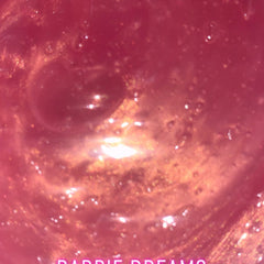 Pink and gold shimmering liquid with bokeh effect, LishasLuxe text visible